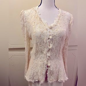 Beautiful Lace blouse. Top size is 11/12 but it fits more like 8.